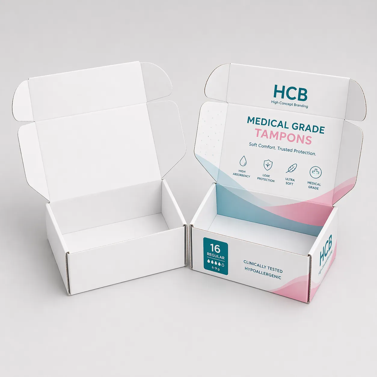 Two cardboard mailing boxes, one plain white and one featuring teal floral medical tampon branding. class=